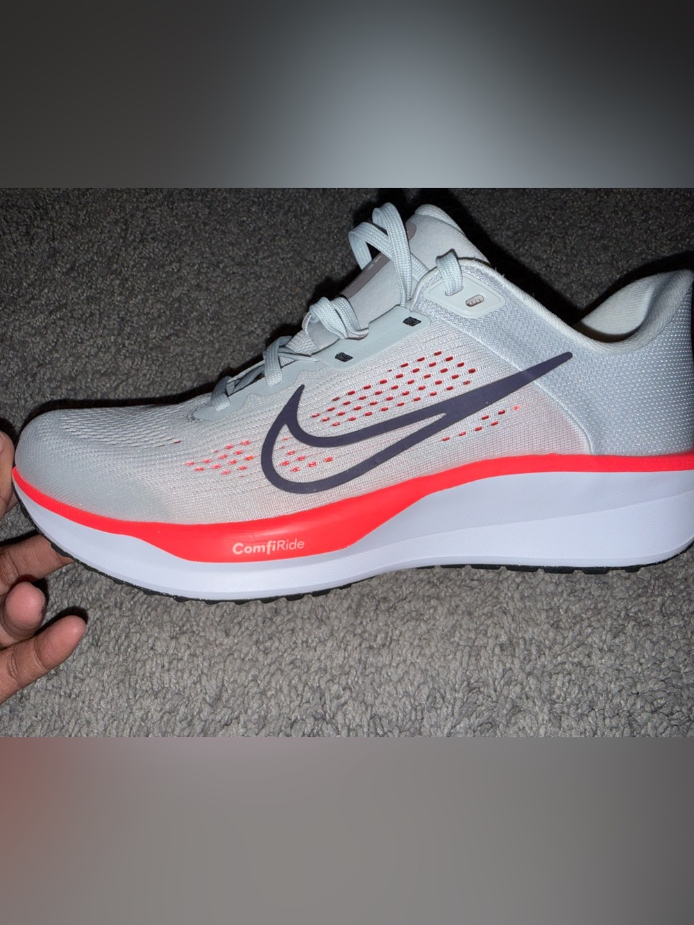 Nike women’s Sneaker in Light Gray with Pink Accent